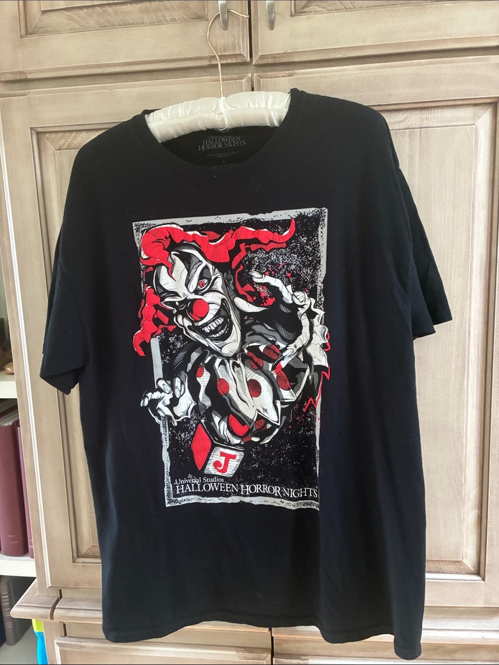 Universal Black Short-Sleeve Tee with Red & White Clown Graphic